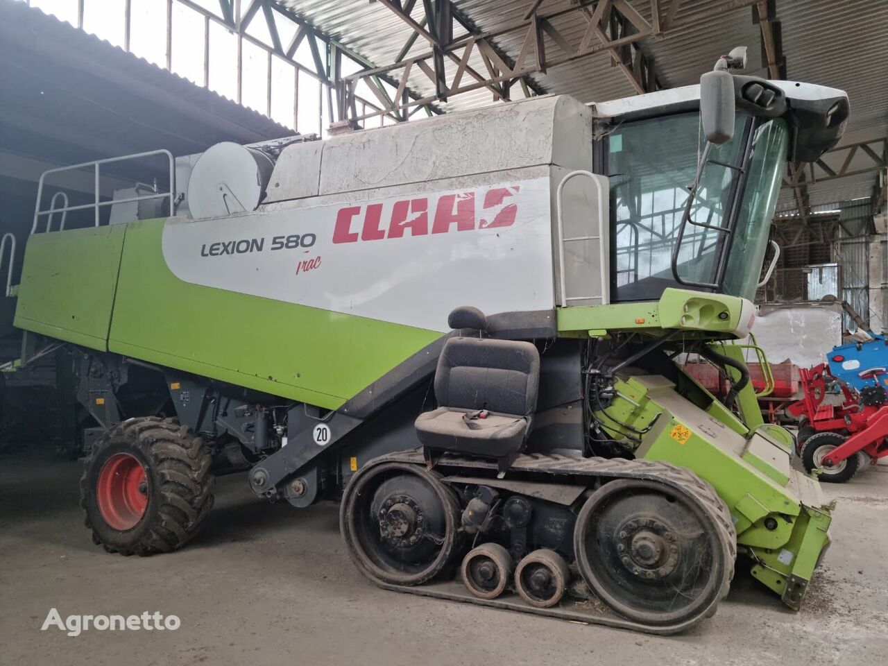 ماكينة حصادة دراسة Claas Lexion 580